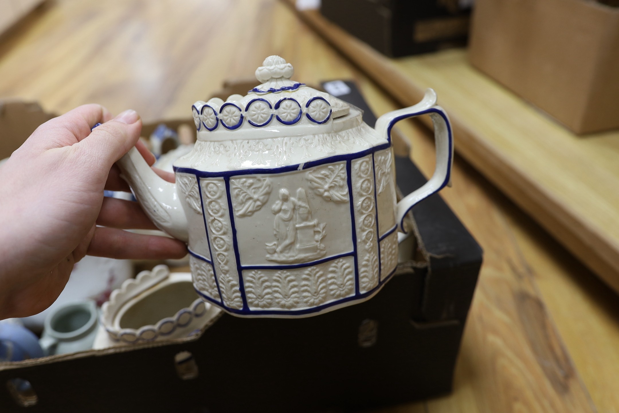 A quantity of various teapots including a pearlware teapot with swan finial, Castleford types, one Wedgwood